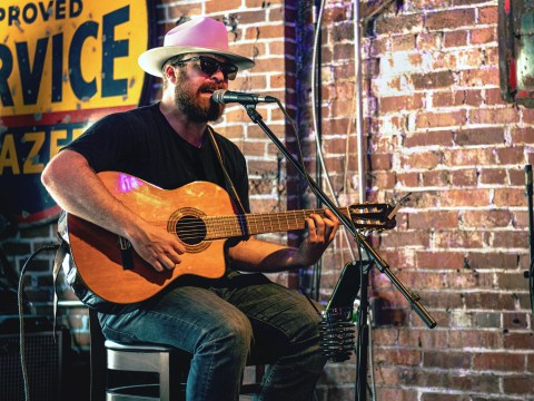 Man Playing Guitar